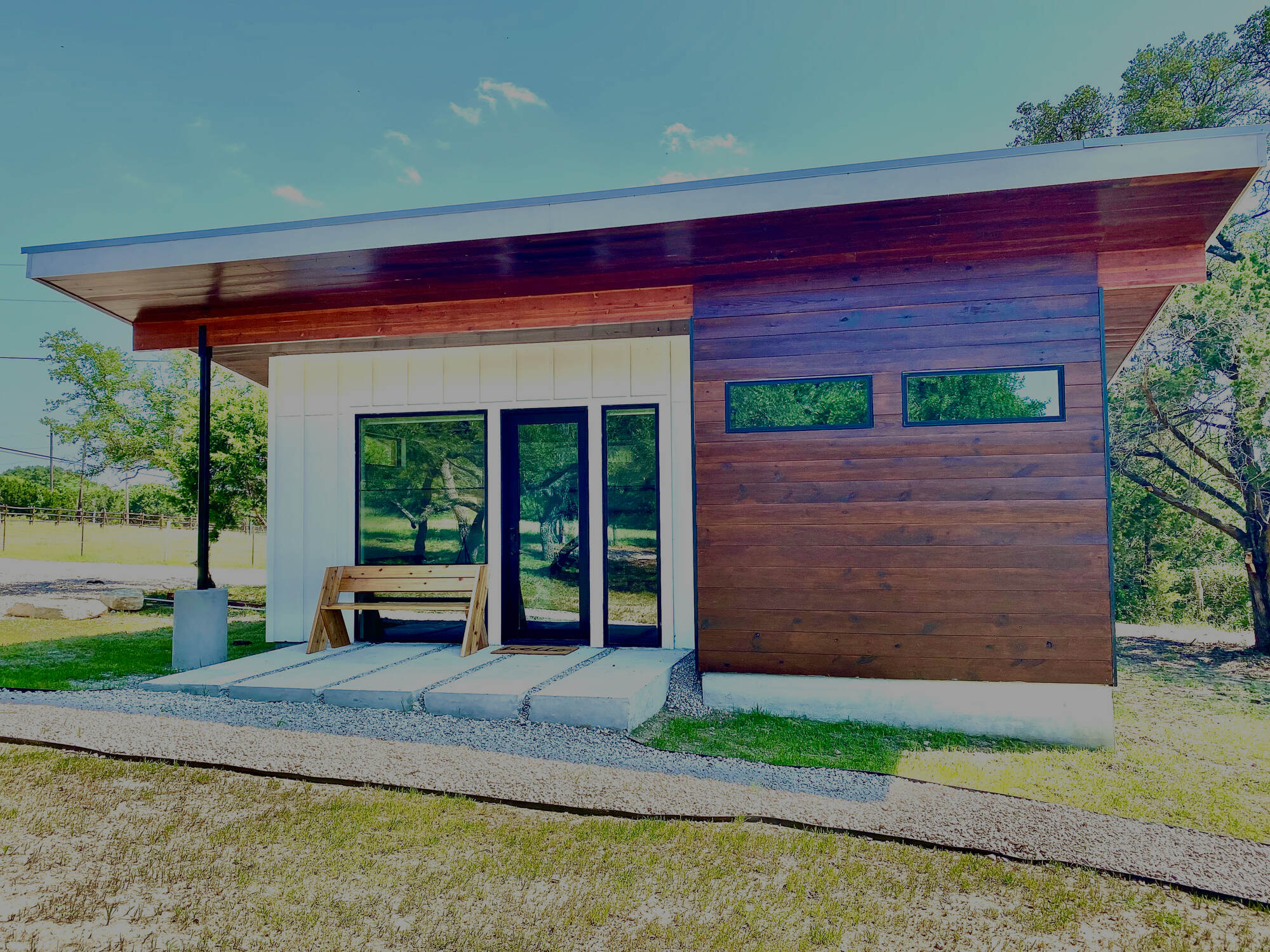 Modern wood-sided tiny house at Tom Dooley’s Hideout